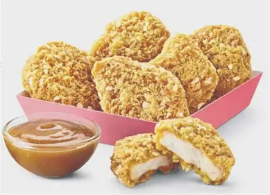  ??  ?? Katsu curry chicken nuggets are a new option at McDonald’s but for a limited time