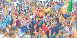  ??  ?? Congress workers celebrate party candidate Kantilal Bhuria's victory in Jhabua assembly bypoll at the party office in Bhopal on Thursday. BJP candidate from Dharamshal­a Vishal Nehria greets the supporter after winning the by-election on Thursday PTI