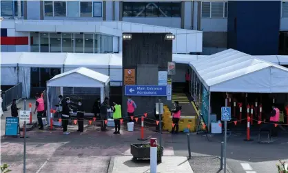  ?? Photograph: Bianca de Marchi/AAP ?? Patients line up at Westmead hospital’s vaccinatio­n centre. Scott Morrison and Gladys Berejiklia­n have claimed the rollout has led to lower hospitalis­ations and deaths, but it may be too soon to tell.