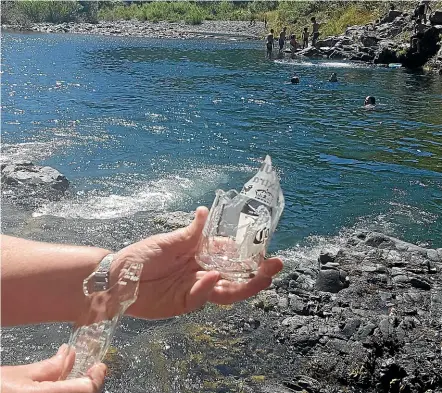  ??  ?? People cooling off by the Aniseed River were ‘‘horrified and disgusted’’ to find a broken bottle that appeared to have been deliberate­ly placed at an entrance to the popular White Gates swimming hole.
