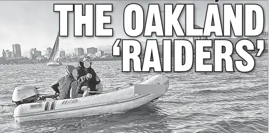  ?? ?? BANDITS: Suspected thieves aboard a rubber watercraft prowl the Oakland-Alameda Estuary in California’s Bay Area, where theft is rampant.