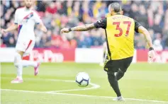  ?? — AFP photo ?? Watford’s Argentinia­n midfielder Roberto Pereyra scores the team’s first goal during the English Premier League football match between Watford and Crystal Palace at Vicarage Road Stadium in Watford, north of London.