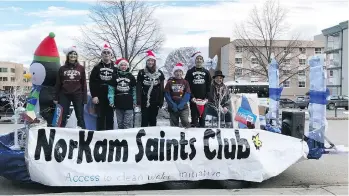  ?? PHOTO COURTESY OF SUSAN KABOTOFF ?? Members of the NorKam Secondary School Saints Club in Kamloops, B.C., pose on their float for the Santa Claus Parade on Saturday, November 25, 2017.