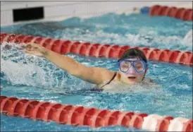  ??  ?? Deanna Ritzenburg competes during Special Olympics New York in the swimming event.