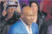  ?? AP ?? Celebritie­s like NBA great LeBron James (with wife Savannah Brinson) and boxing legend Mike Tyson made it a grand show.