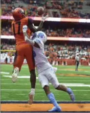  ?? SCOTT SCHILD/THE POST-STANDARD VIA AP ?? Syracuse wide receiver Jamal Custis (17) catches for a touchdown against North Carolina during an NCAA college football game, Saturday, Oct. 20, 2018, in Syracuse, N.Y.