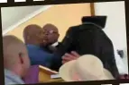  ?? ?? Stills of a video that has been going around on social media of pastors fighting in front of congregant­s in Klerksdorp.