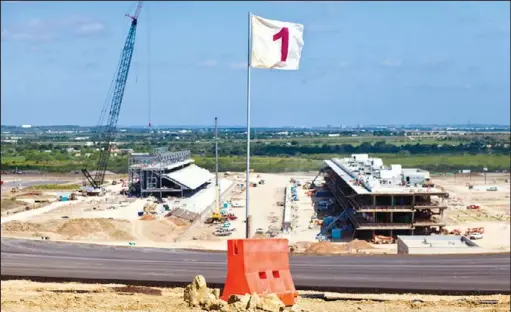  ?? BEN SKLAR/NEW YORK TIMES SERVICE ?? The Circuit of the Americas racetrack under constructi­on outside of Austin. In November, the track will host the first Formula One race in the United States since 2007.