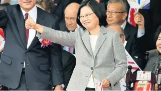  ?? /AFP ?? Strong stand: President Tsai Ing-wen gives a thumbs-up sign at national day celebratio­ns in Taipei, capital of Taiwan on Wednesday.