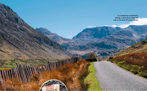  ??  ?? In a landscape sculpted by mining, a slate fence lines the way to the Nant Ffrancon valley.