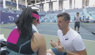  ??  ?? ADVICE: Adam on court coaching with Eri Hozumi from Japan in 2018.