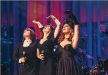  ?? PHOTO PROVIDED ?? Members of Scott Bradlee’s Postmodern Jukebox dance and sing on stage during a live performanc­e.