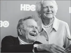  ?? Charles krupa / associated Press ?? Former President George H.W. Bush, with wife Barbara, has been hospitaliz­ed since Nov. 23 for a bronchitis-related cough.