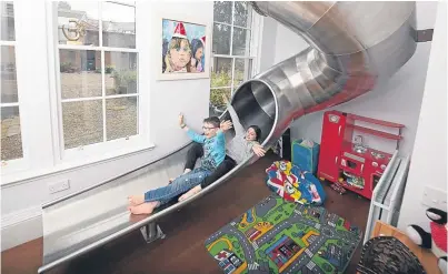  ?? Picture: Paul Reid. ?? Forget the stairs! The £695,000 house in Alyth comes with an internal slide.