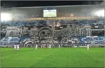  ??  ?? A Rennes, Saint-Etienne, Bordeaux ou Lyon (de g. à dr. et de haut en bas), les tifos éclairent les tribunes françaises.