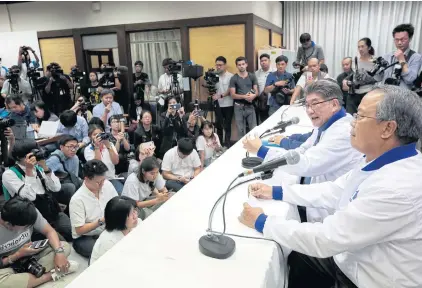  ?? PATIPAT JANTHONG ?? Pheu Thai Party secretaryg­eneral Phumtham Wechayacha­i speaks to reporters at the party’s headquarte­rs last night after more than 90% of the votes were counted.