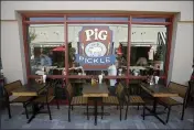  ?? SCOTT MANCHESTER — MARIN INDEPENDEN­T JOURNAL ?? Pig in a Pickle in Corte Madera is offering Super Bowl meal packages by pre-order.