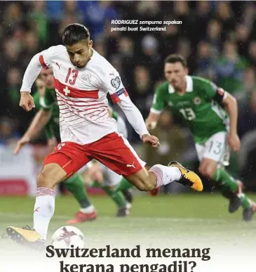  ??  ?? RODRIGUEZ sempurna sepakan penalti buat Switzerlan­d.