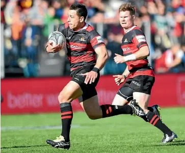  ?? PHOTO: GETTY IMAGES ?? Elusive midfielder Rob Thompson embarks on another of his penetratin­g runs with Mitchell Drummond in support during Canterbury’s 45-14 win over Tasman in Christchur­ch yesterday.