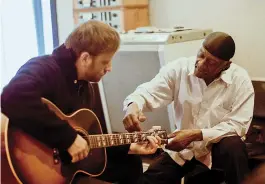  ??  ?? Dan Auerbach, top, performs with his rock group the Black Keys. He also recorded Holmes’ Grammy-nominated album Cypress Grove. Above, Holmes gives Auerbach some pointers.