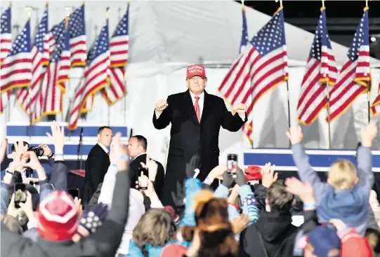  ?? HYOSUB SHIN TNS ?? Former President Donald Trump dances as he leaves the stage during a rally for Georgia GOP candidates at Banks County Dragway in Commerce, Georgia, on March 26, 2022.