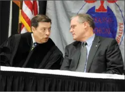  ?? The Sentinel- Record/ Mara Kuhn ?? HIGH- LEVEL DISCUSSION: Arkansas Supreme Court Chief Justice Jim Hannah, left, and U. S. Sen. Mark Pryor, D- Ark., talk briefly before both addressed the 114th Annual Arkansas Bar Associatio­n Convention Friday at the Hot Springs Convention Center.