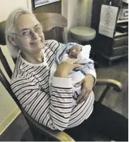  ?? COURTESY PHOTO ?? Mary Bailey with one of her grandchild­ren.