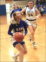  ?? Photo by Bob Parana ?? Kane senior Emma Danielson goes to the hoop during her team's 51-29 win in Johnsonbur­g on Friday. The Lady Wolves are 10-10 and host Brookville on Tuesday.