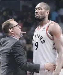  ?? Chris Young Associated Press ?? COACH NICK NURSE, with Serge Ibaka, is employing multiple starting lineups instead of sticking with a set five.