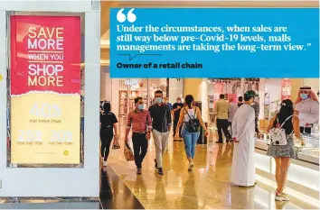  ?? Antonin Kélian Kallouche/Gulf News ?? Shoppers at a mall in Dubai. Industry sources say that retailer cash flows will continue to be volatile until such time enough consumers believe they can start spending a bit more freely.