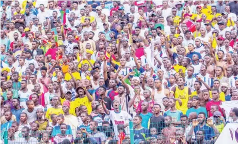  ?? ?? Vociferous Gombe football fans watch the ‘Savannah derby’ between Gombe United and Doma United at Pantami Stadium on November 5