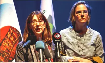  ??  ?? Director Zeva Oelbaum of ‘’Letters from Baghdad,’’ a documentar­y about Gertrude Bell, speaks to people at the National Theatre of Baghdad. — Reuters photo