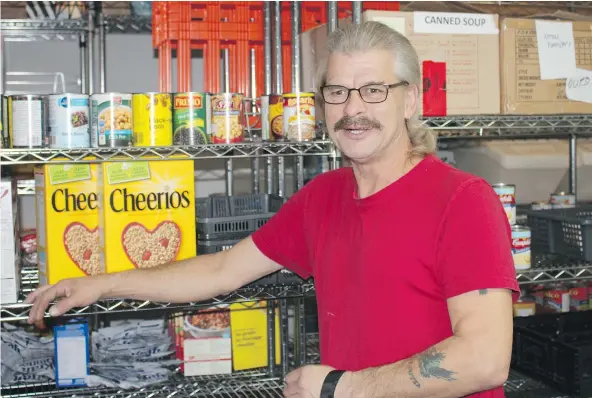  ??  ?? Agassiz resident Gord Caithness is one of an increasing number of single men who receives a Christmas hamper from Agassiz-Harrison Community Services. The agency is supported by The Province’s Empty Stocking Fund.