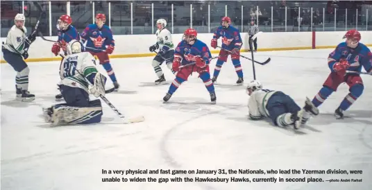  ?? —photo André Farhat ?? In a very physical and fast game on January 31, the Nationals, who lead the Yzerman division, were unable to widen the gap with the Hawkesbury Hawks, currently in second place.