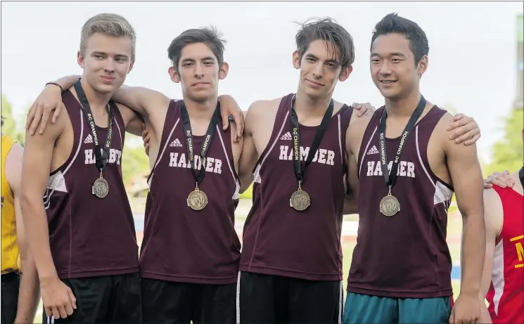  ?? PHOTOS: WILSON WONG/UBC ATHLETICS FILES ?? Hamber’s 4x400 senior boys relay team of Sam Prevost, left, Rui Ando, Leo Ando and Jee Woon Ha proudly display their gold medals.