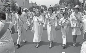  ?? DENNIS COOK/AP ?? Leading supporters of the Equal Rights Amendment march in Washington in 1978, urging Congress to extend the time for ratificati­on.