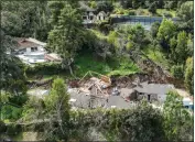  ?? ROBERT GAUTHIER — LOS ANGELES TIMES ?? A landslide destroyed a home and three other residences were damaged near Ventura Canyon Avenue in Sherman Oaks, as seen Wednesday from the air.