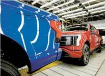  ?? BILL PUGLIANO GETTY IMAGES ?? Strict requiremen­ts exist for tax credits on EVS, such as the Ford F-150 Lightning. They will get stricter over time.