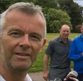  ??  ?? Celebratin­g a hole-in-one at the fifth in Dundalk with Davy McDonnell, taking the selfie, Ciaran Murray (left) and Paul Morgan (right); and below with the Champions League trophy won by Liverpool in 2019.