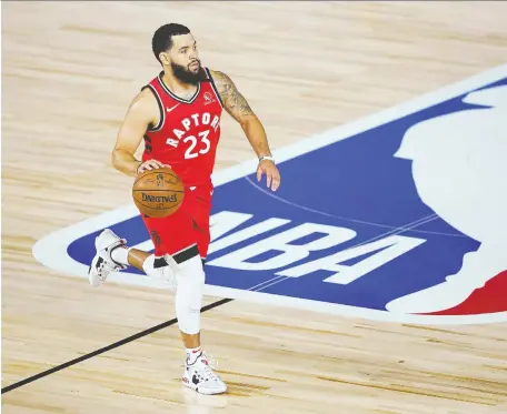  ?? ASHLEY LANDIS/GETTY IMAGES ?? Fred VanVleet moves the ball up court for the Raptors during a game against the Miami Heat on Monday at the ESPN Wide World Of Sports Complex in Lake Buena Vista, Fla. VanVleet scored a career-best 36 points as the Raptors downed the Heat 107-103.