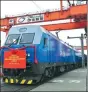  ?? TAN YINGZI / CHINA DAILY ?? A cargo train leaves Chongqing’s Tuanjiecun Railway Station on Monday, marking the opening of a rail-sea route that connects Chongqing to Southeast Asian countries.