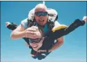  ?? COURTESY OFVALERIE BENNETT ?? Phillip Bennett, of Fremont, goes skydiving near Santa Rosa with tandem coach Doug Behrick, top.