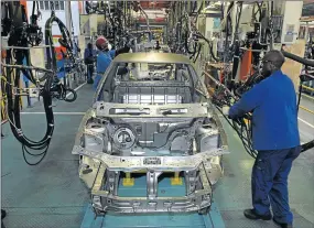  ?? Picture: FILE ?? ROBOT THREAT: The global move towards automation in the motor industry has put plans to provide more jobs for South African workers under severe pressure
