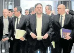  ??  ?? Rull, Junqueras y Romeva, en su comparecen­cia en el Parlament en enero de 2020.