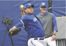  ?? STEVE NESIUS/THE CANADIAN PRESS FILES ?? Jays pitching coach Pete Walker says Hyun-jin Ryu has demonstrat­ed a tremendous work ethic.