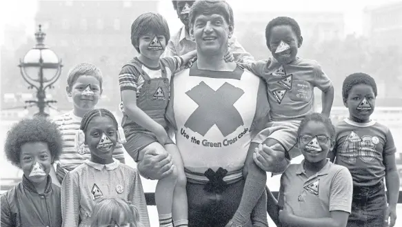  ?? ?? Actor Dave Prowse returns as the Green Cross Code Man for a version of the public informatio­n film that was aimed at grown-ups. Photo: PA Wire