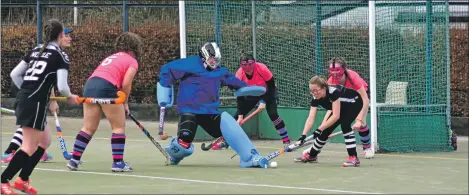  ?? 01_B07hockey0­4 ?? Ali ‘Ninja’ McKie kicks the ball and prevents a Stepps goal.