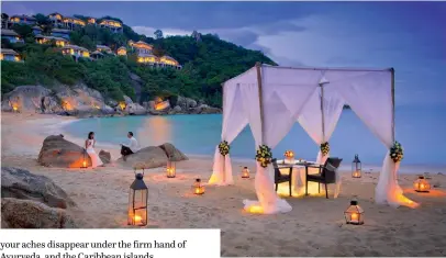  ??  ?? A private dinner setup at Banyan Tree Samui. Bottom: The spa at Banyan Tree Samui.