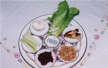  ??  ?? THE PASSOVER seder plate – this Passover let us give a final blow to separation and egoism.