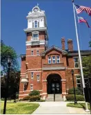  ?? AJC PHOTO ?? The Gwinnett Historic Courthouse in downtown Lawrencevi­lle was built in 1885, replacing an earlier courthouse built in 1872. Architectu­ral features include the original turret (balcony) and clock tower.